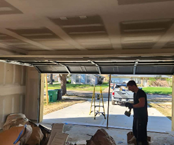 Broken Garage Door Spring Repair Services in Texas by Overhead Door Solutions